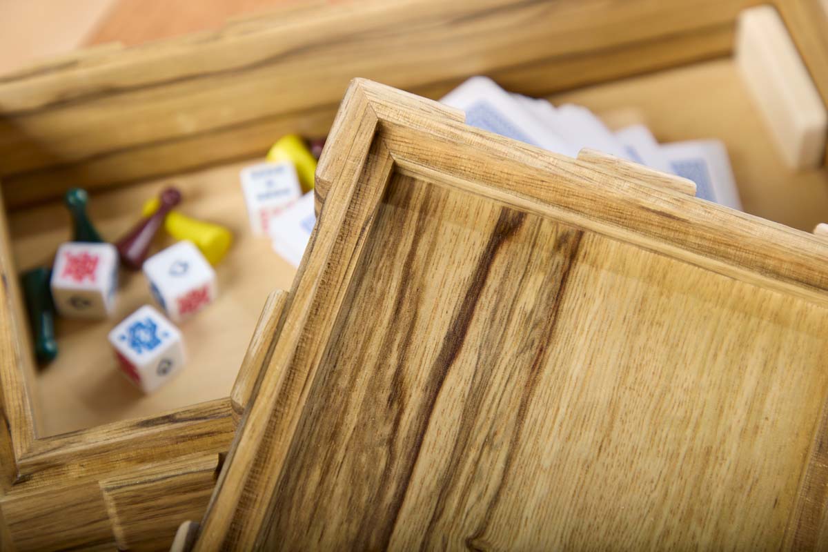image showing mitered joinery of the tiled box with dice game pieces inside