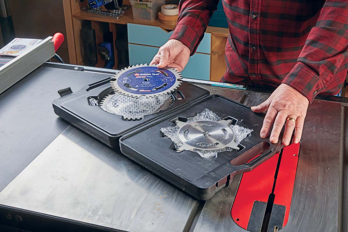 Placing saw blades into storage container