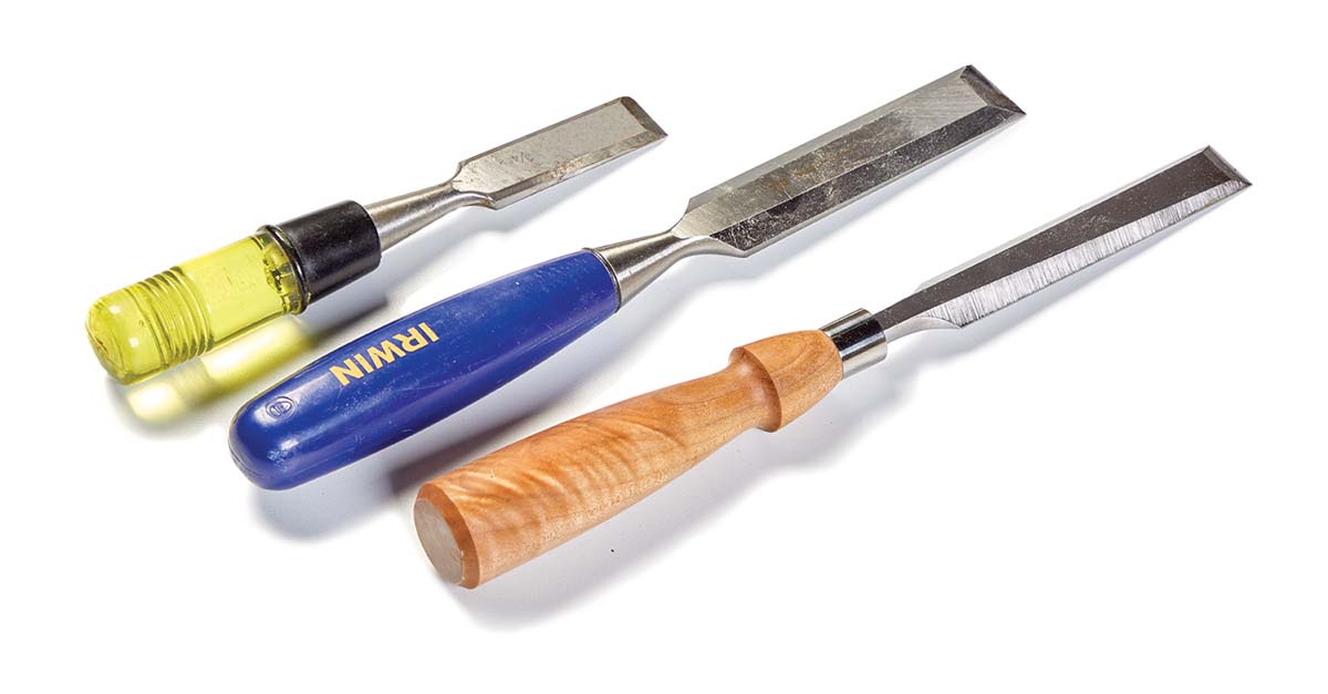 3 chisels: yellow lime bargain butt chisel, blue medium quality bench chisel, wood handle high quality bench chisel