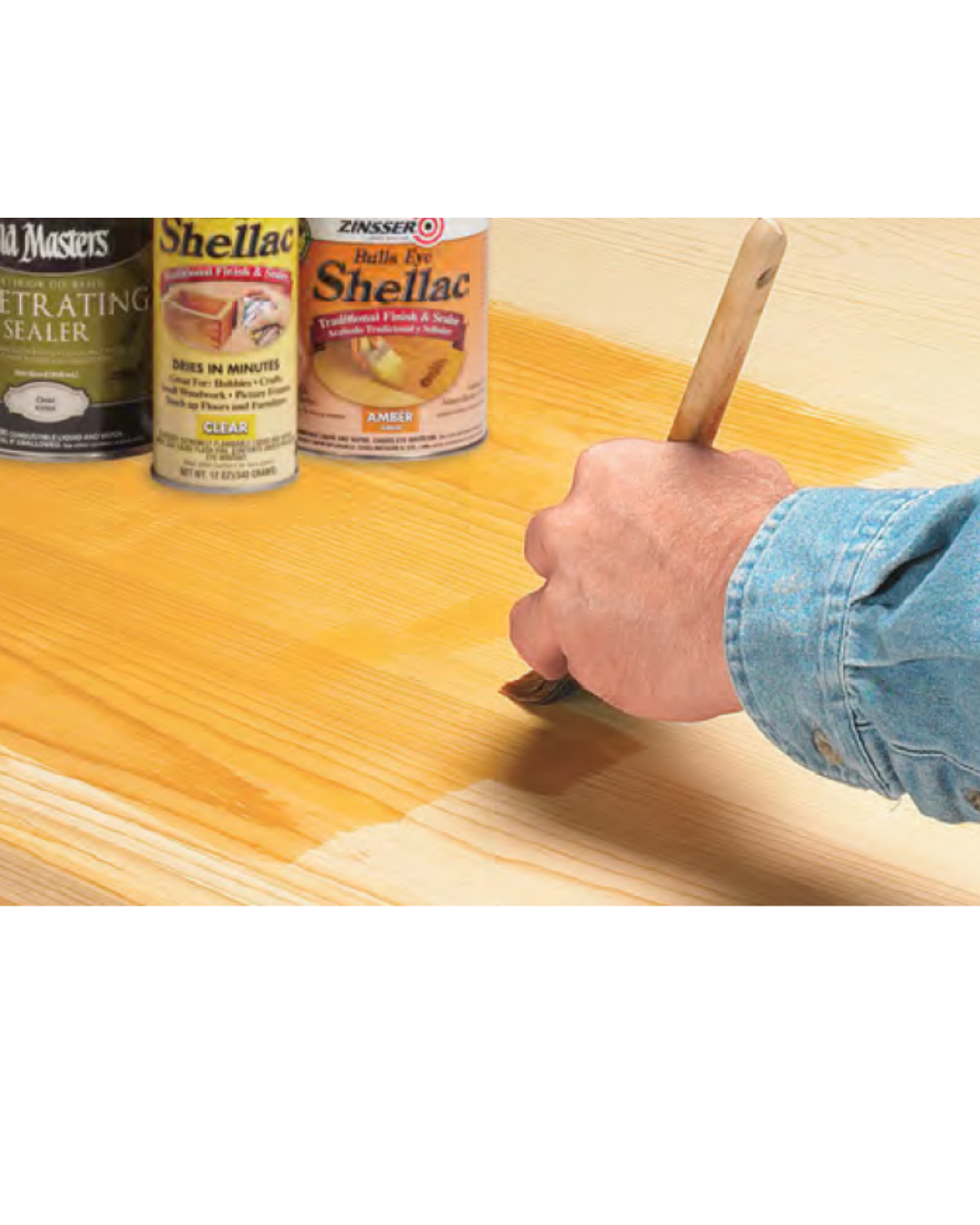 Image shows brushing sealer onto wood for protective finish