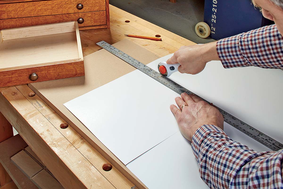 using wheel cutter to cut posterboard