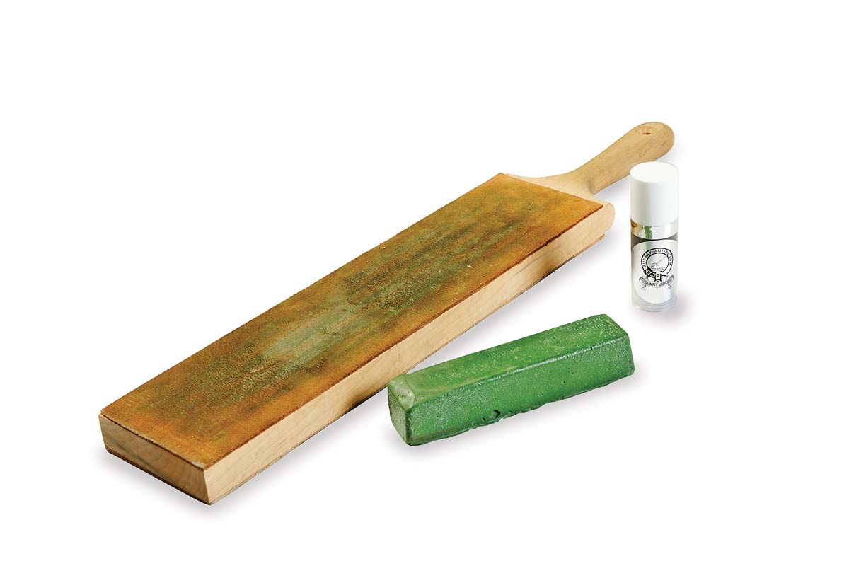 leather strop glued on wood paddle, green polishing compound, and Gunny Juice honing spray