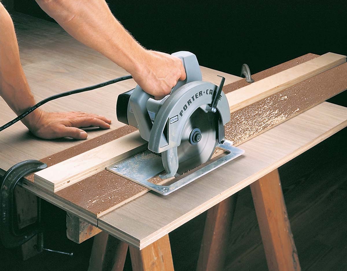 circular saw cutting plywood