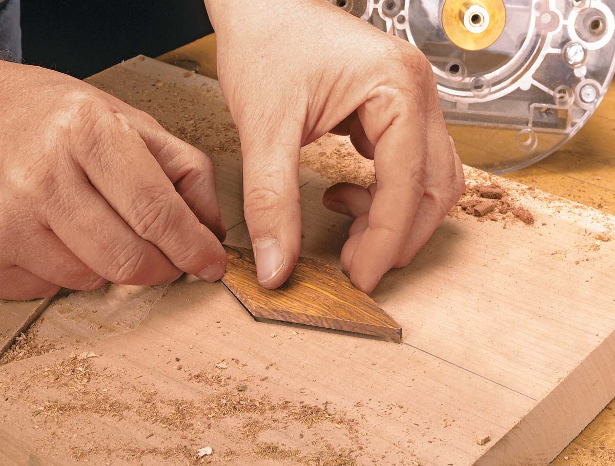 compare workpiece of inlay to template