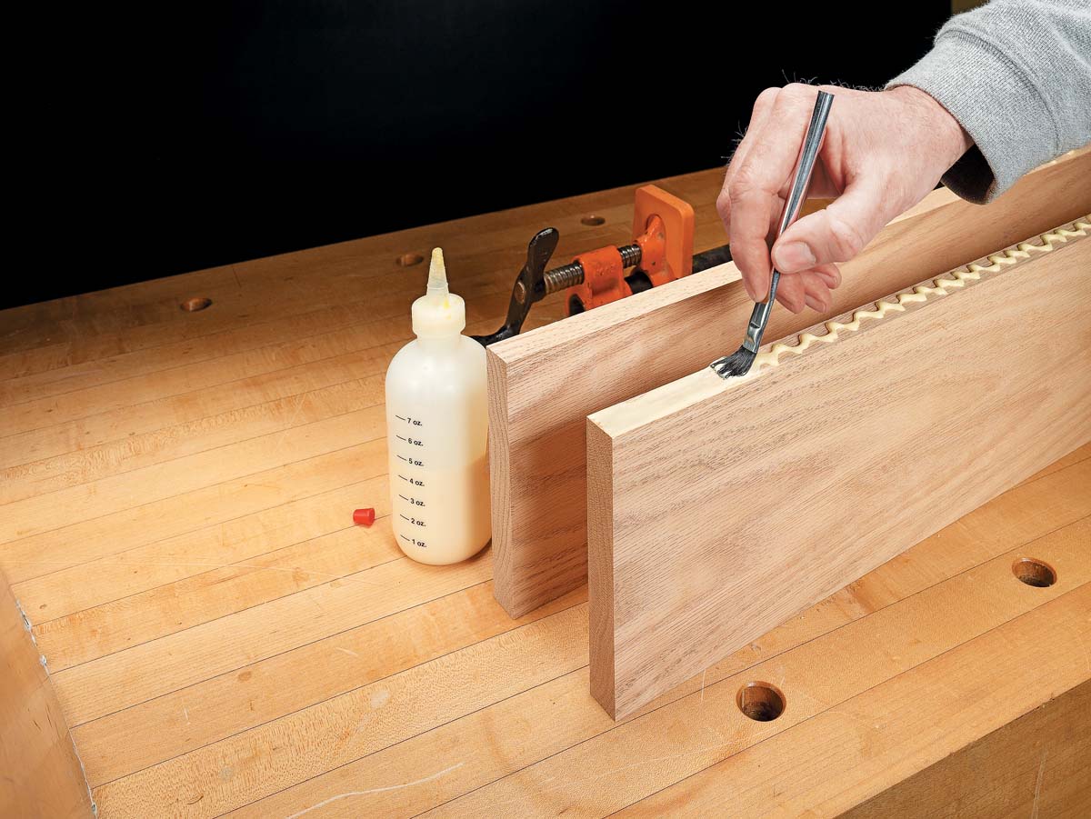 pva glue being brushed onto woodpiece