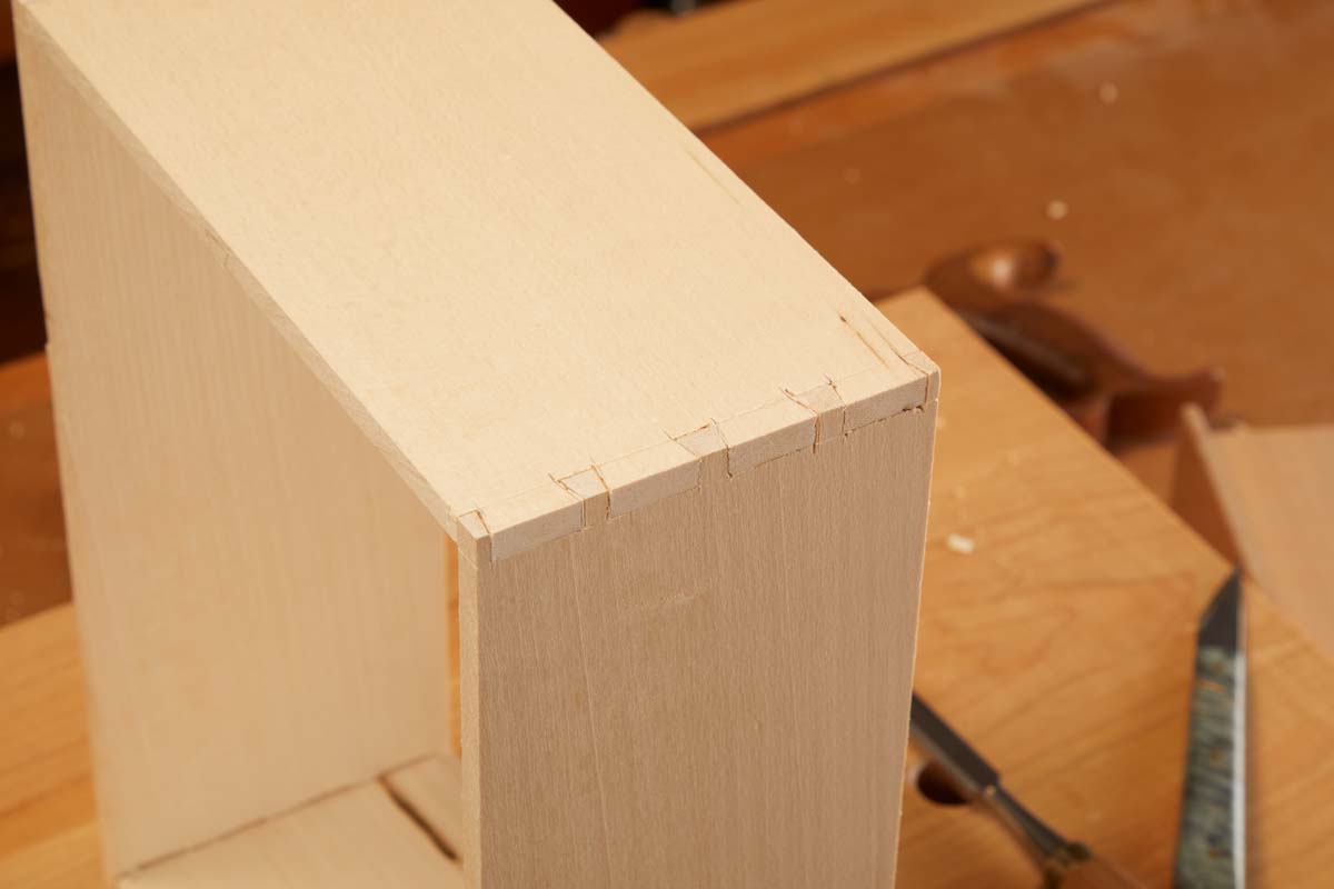 dovetail ends of box fitting tightly together