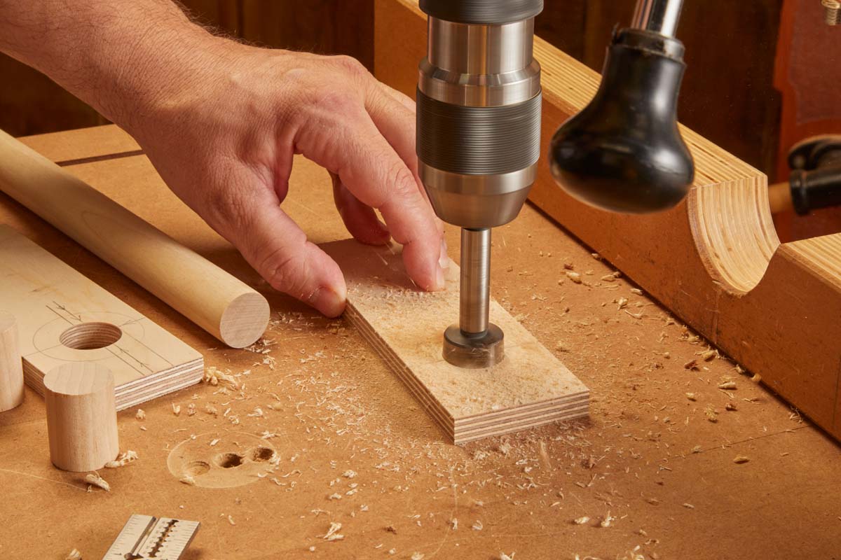 using drill press to drill hole for dowel