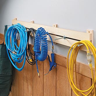 DIY Adjustable Wall Rack for Shop Cords & Hoses