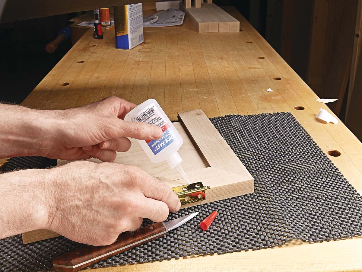 cyanoacrylate glue bond a metal hinge to a wood frame