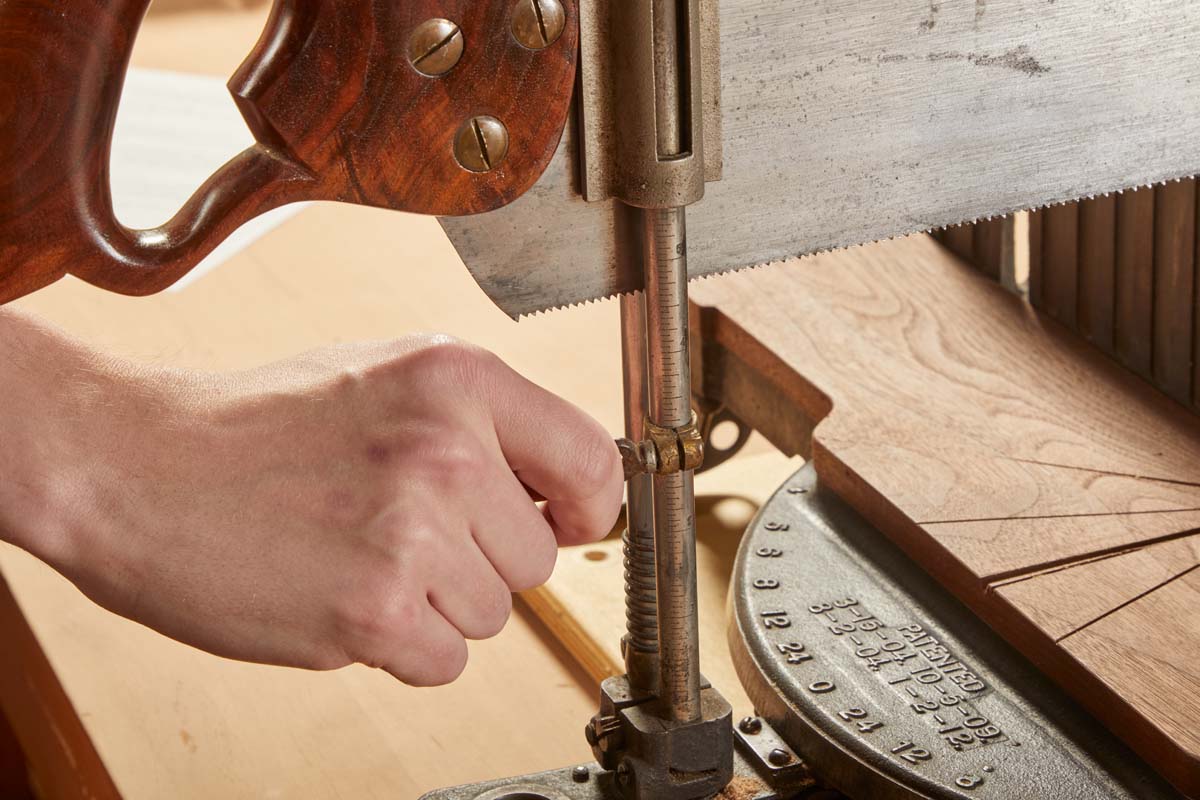 Stop collars on the cylinder rails of the vintage commercial miter box