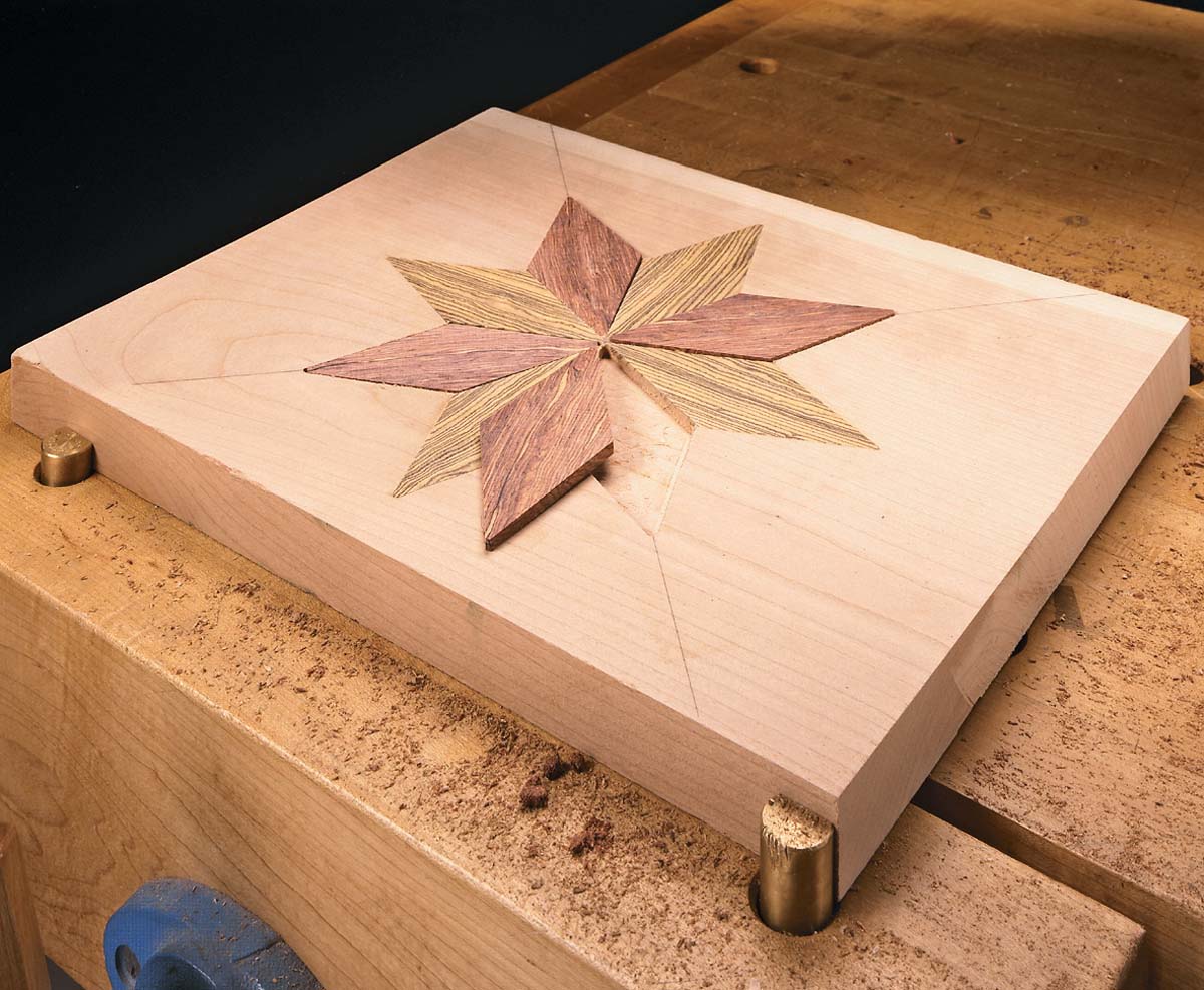 inlay star 9 pointed pattern nearly finished except for 1 piece left