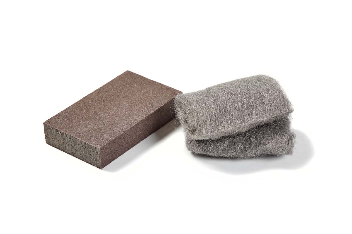 sanding pad and steel wool for scrubbing