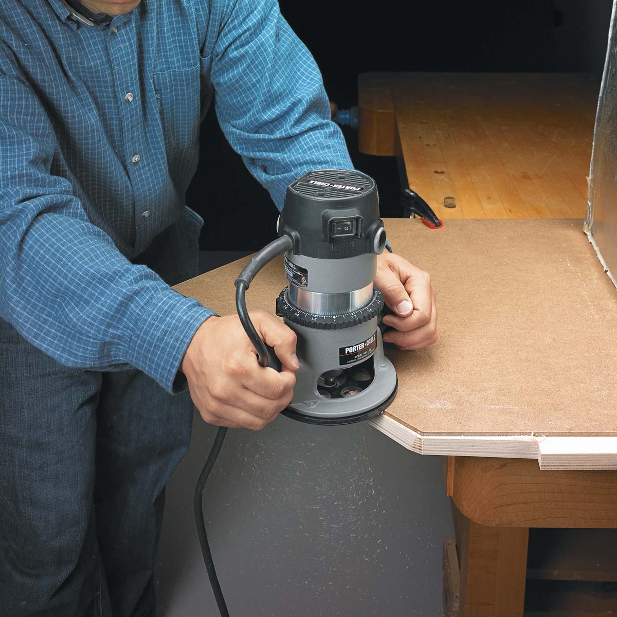 template being used for straight edges with handheld router