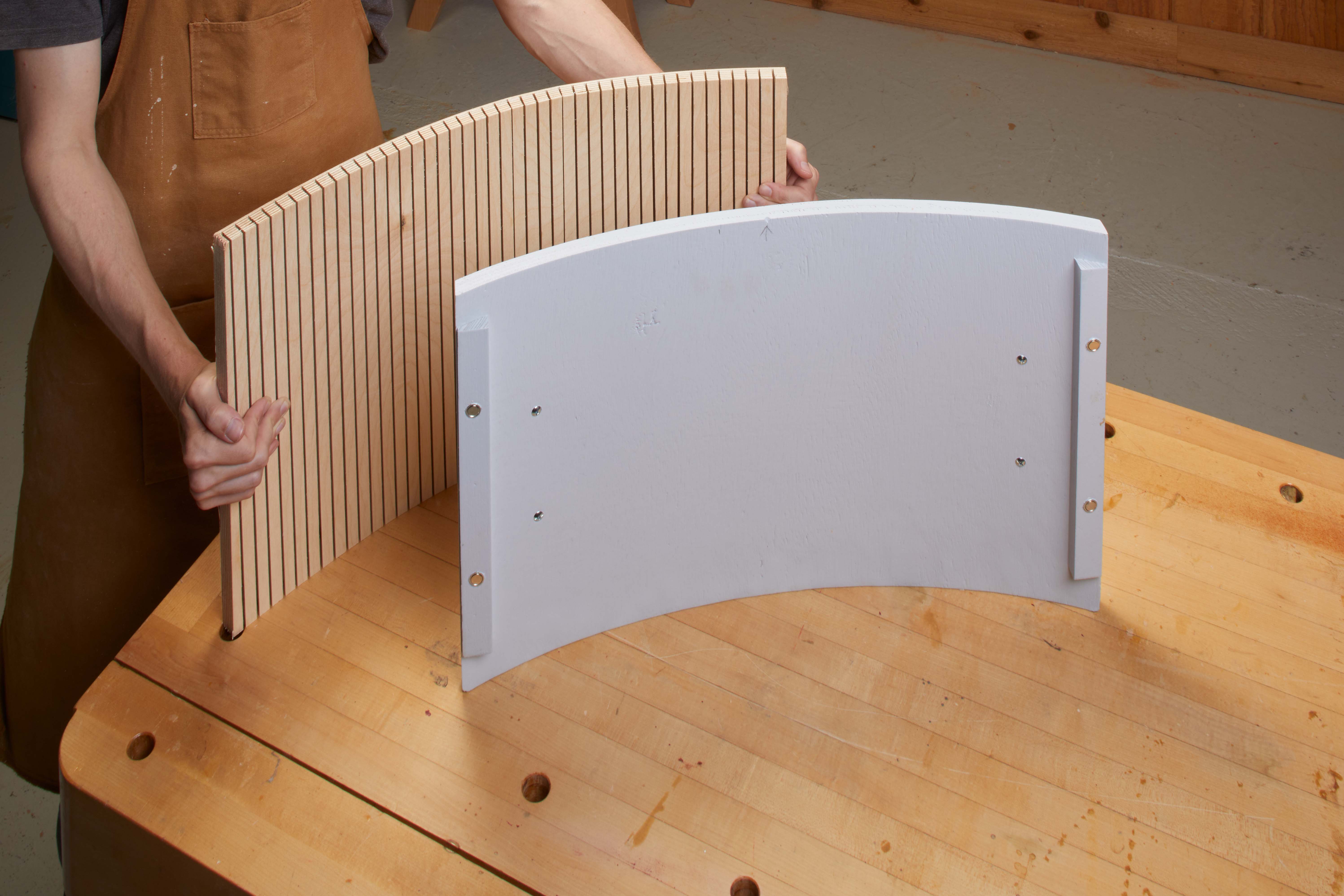 wood kerf bent board and a laminate backer board