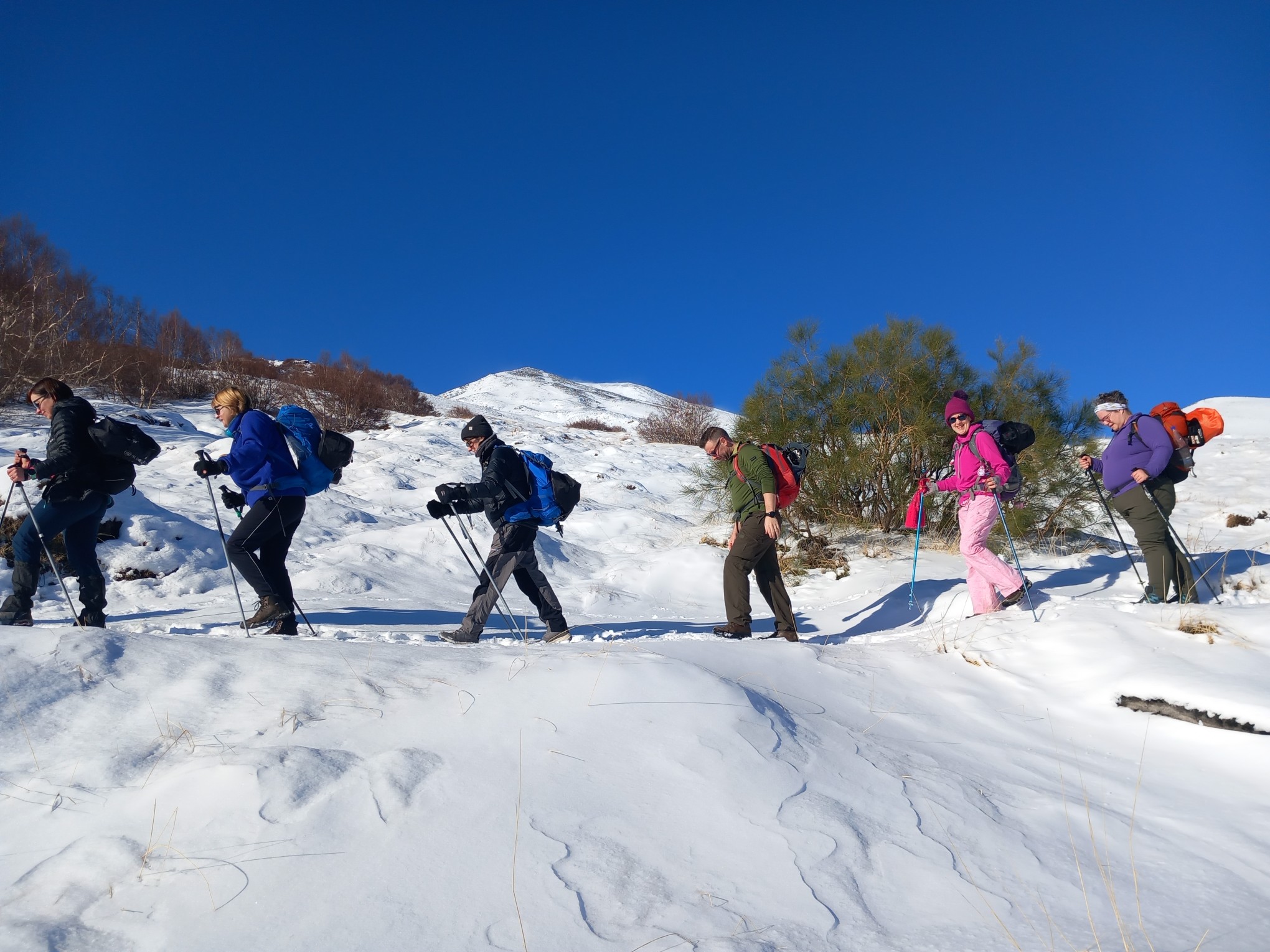 Hiking snowy Mount Etna, Sicily, Italy