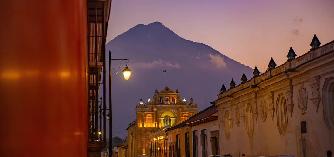 Antigua at dusk with Volcán de Agua behind