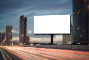 Blank billboard on the highway during the twilight