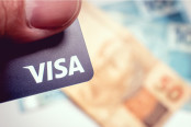 Man Holding Visa Credit Card