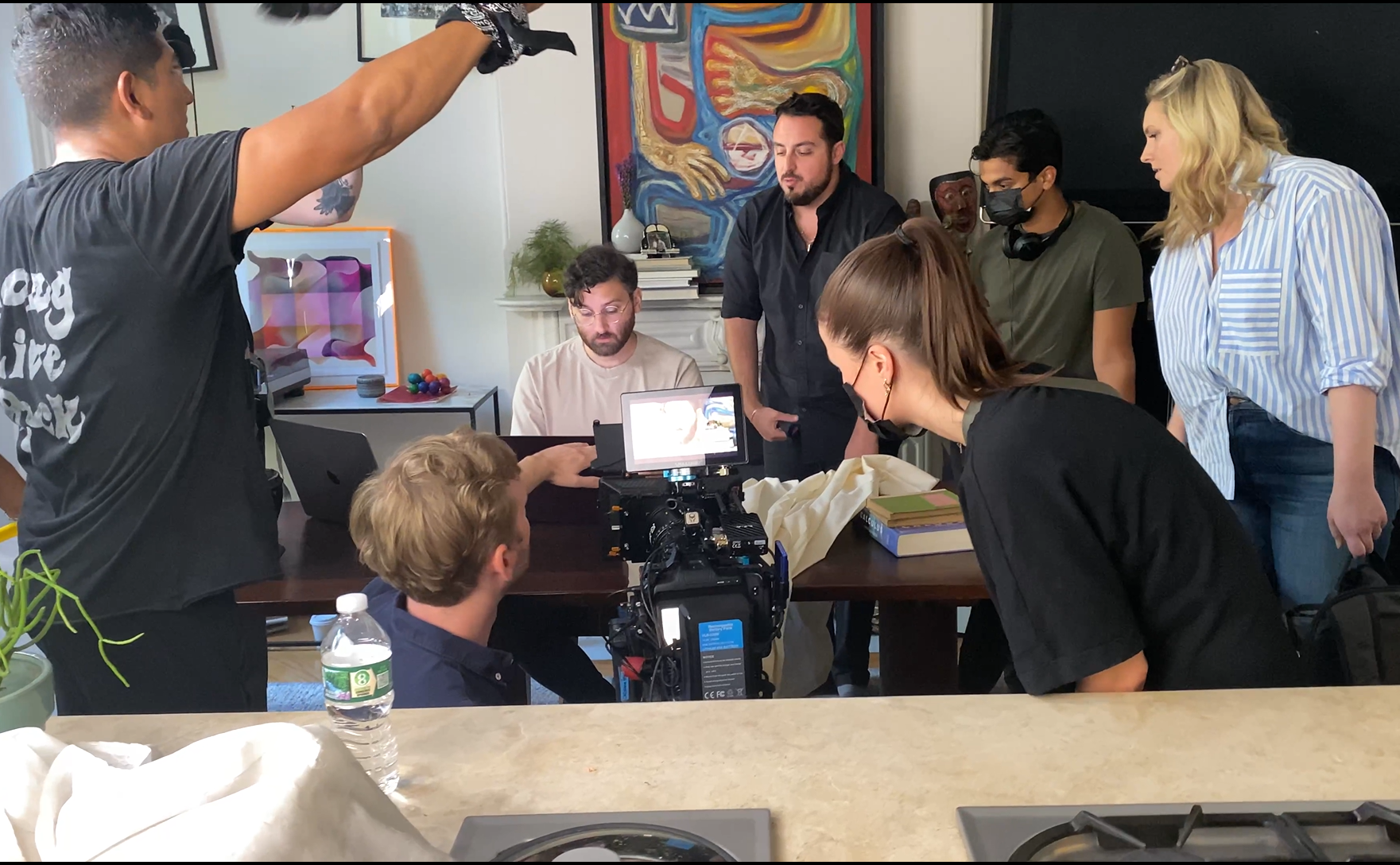 Team planning a shot on set