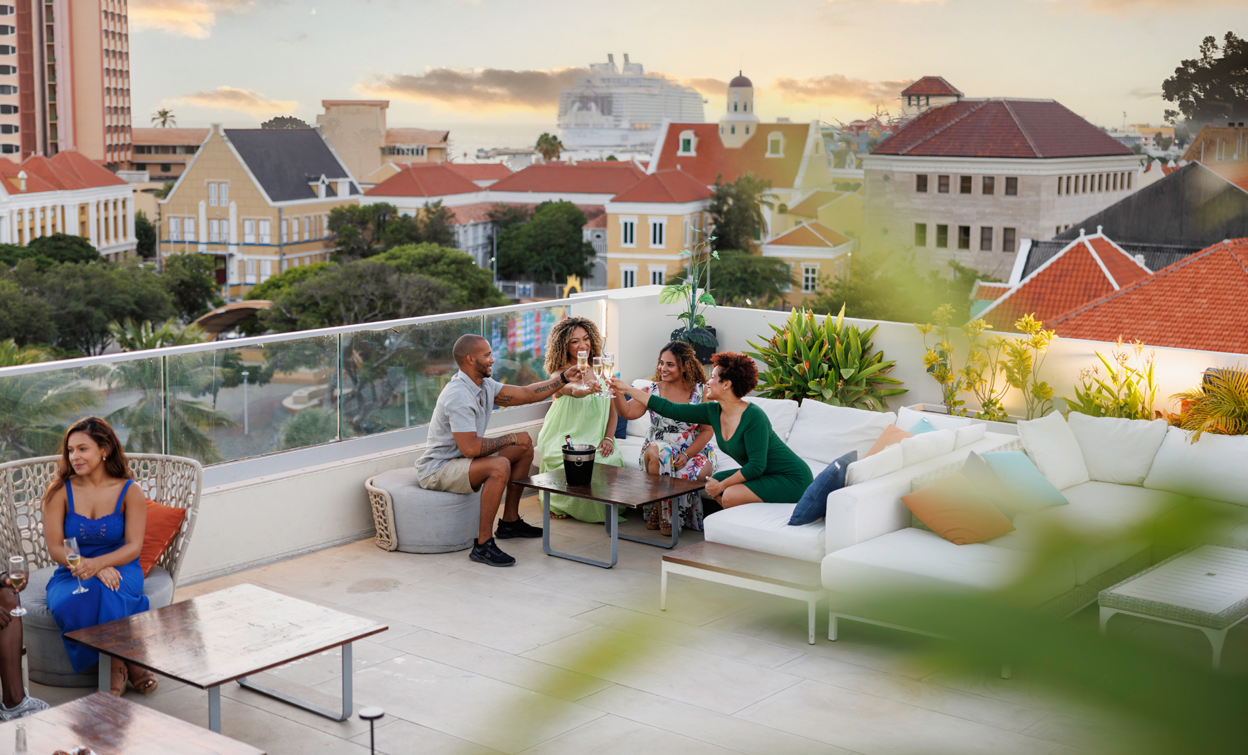 Rooftop clinking glasses