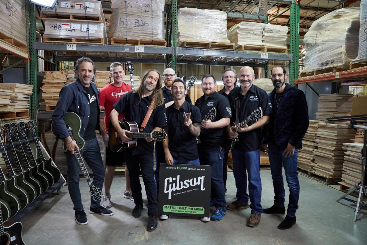 Gibson Gives donates guitars and strings to Guitars For Vets.
L -R: James 