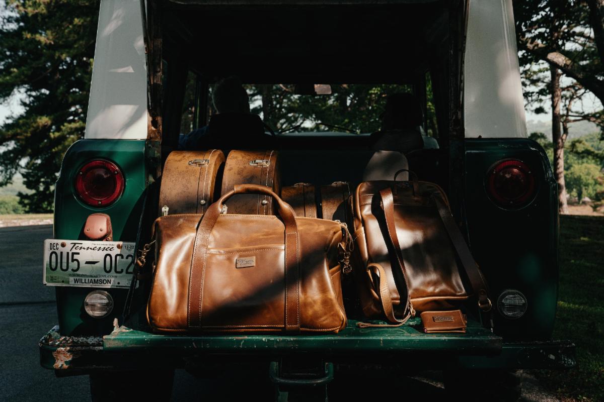 The Lifton Collection (dufflebag, backpack, wallet, and guitar cases).