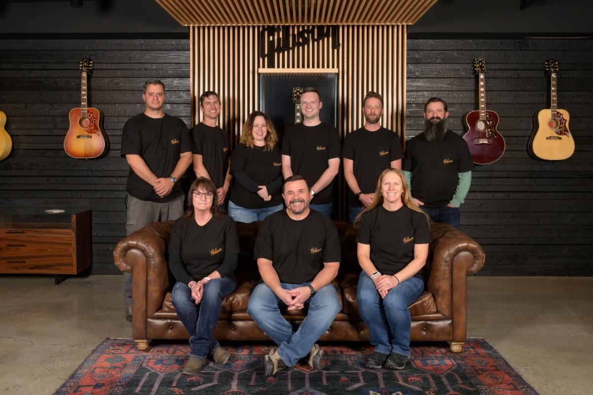 Gibson Bozeman team. (L-R, back row) Richard Walbe (Training Coordinator), Adam Dieckman (Materials Manager), Tiffaney Loomis (Shipping Manager), Colin Beck (Engineering Manager), Patrick Hansen (QC Manager), Nick Codding (Production Manager) and (L-R, front row) Margaret Hawthorne (Human Resource Business Partner), Josh Taborski (Facility Director), and Jackie O’Reilly (Controller).