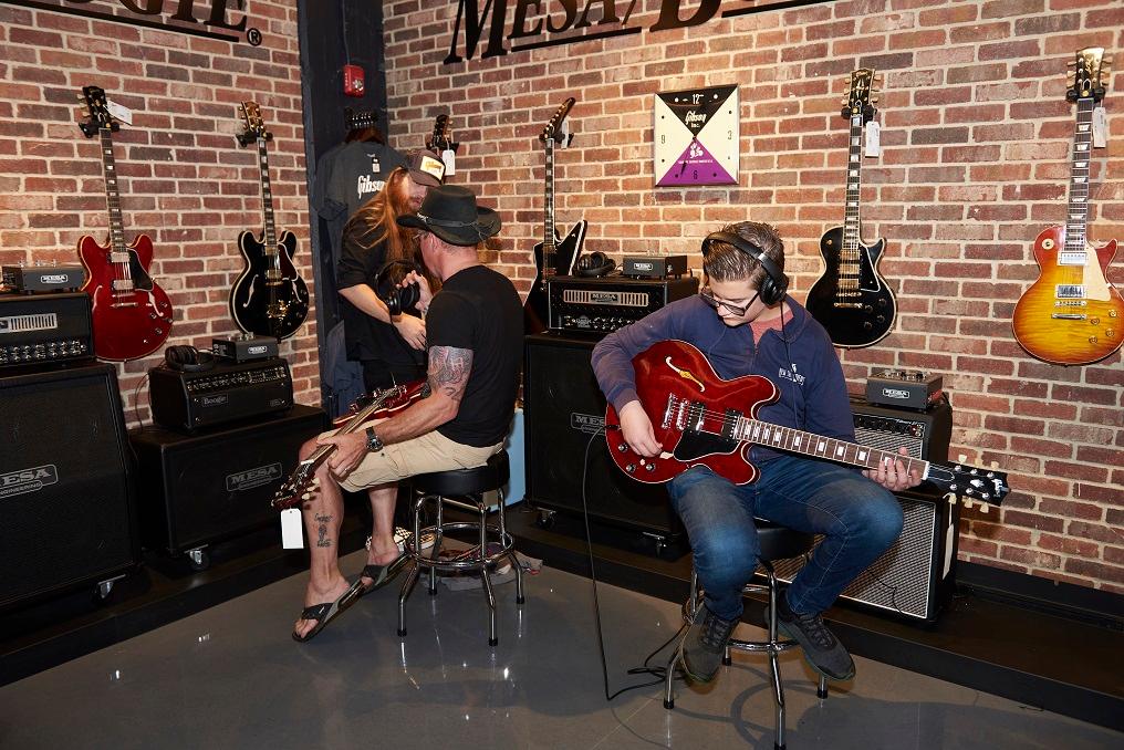 Music fans plug in and play in the MESA/Boogie section of the Gibson Garage.