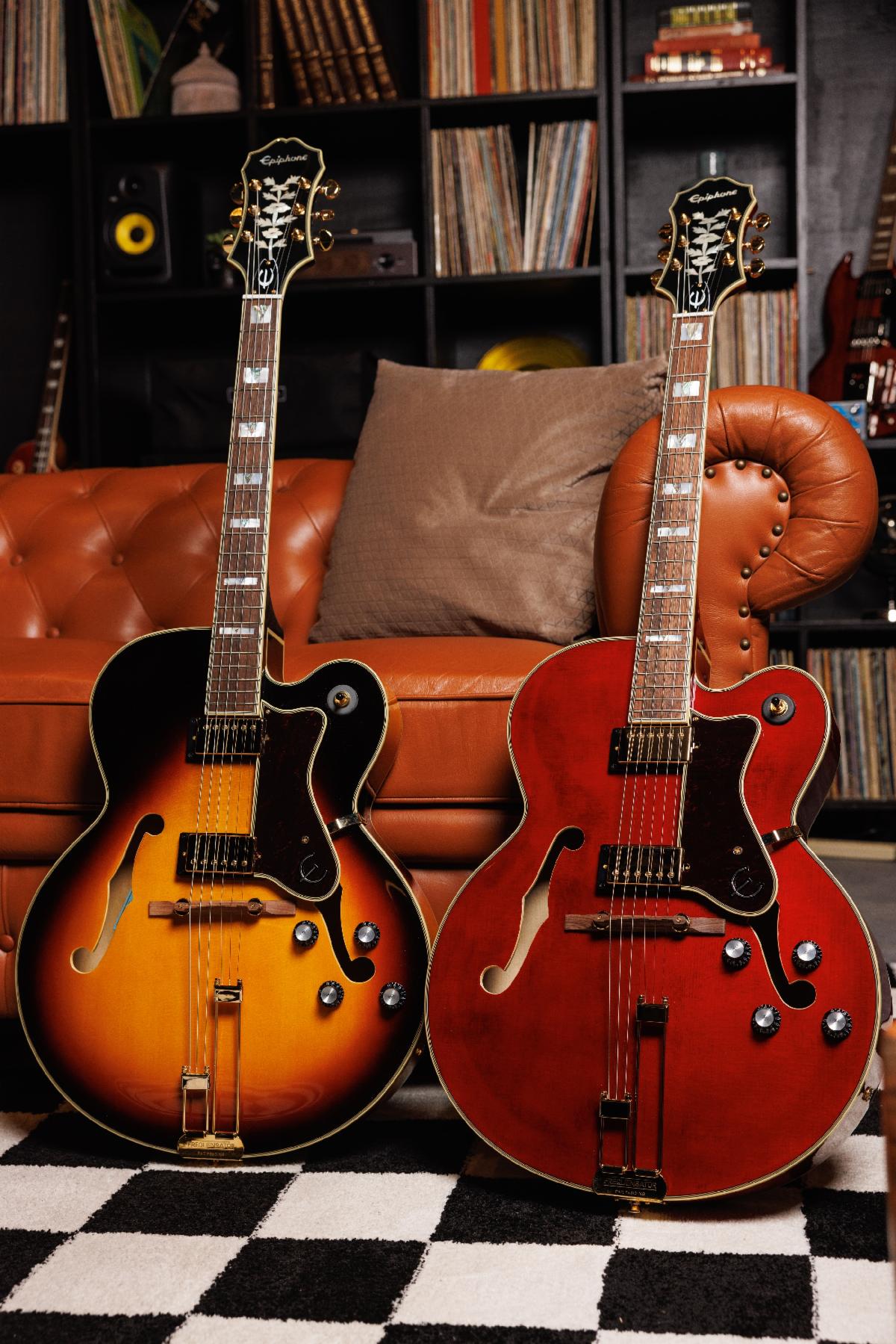 (L-R): Epiphone Broadway in Vintage Sunburst and Wine Red.