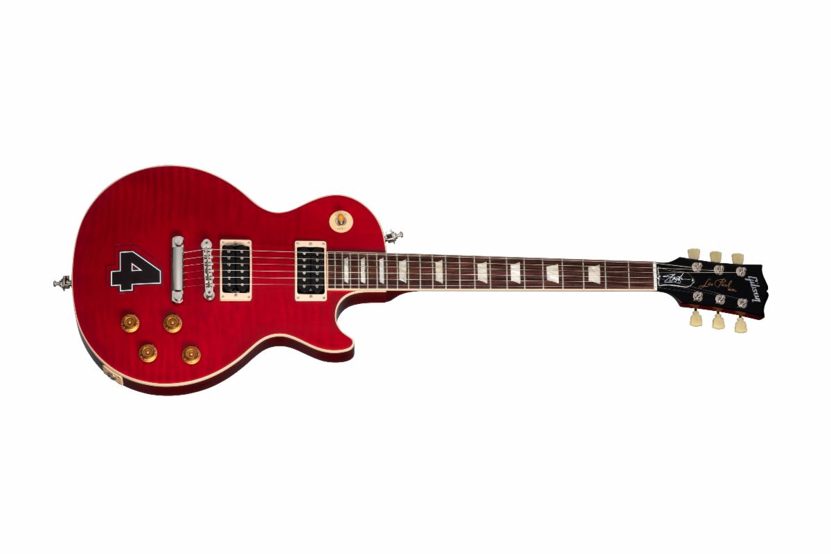 Slash Les Paul Standard 4 Album Edition guitar in Translucent Cherry, with an album decal sticker.