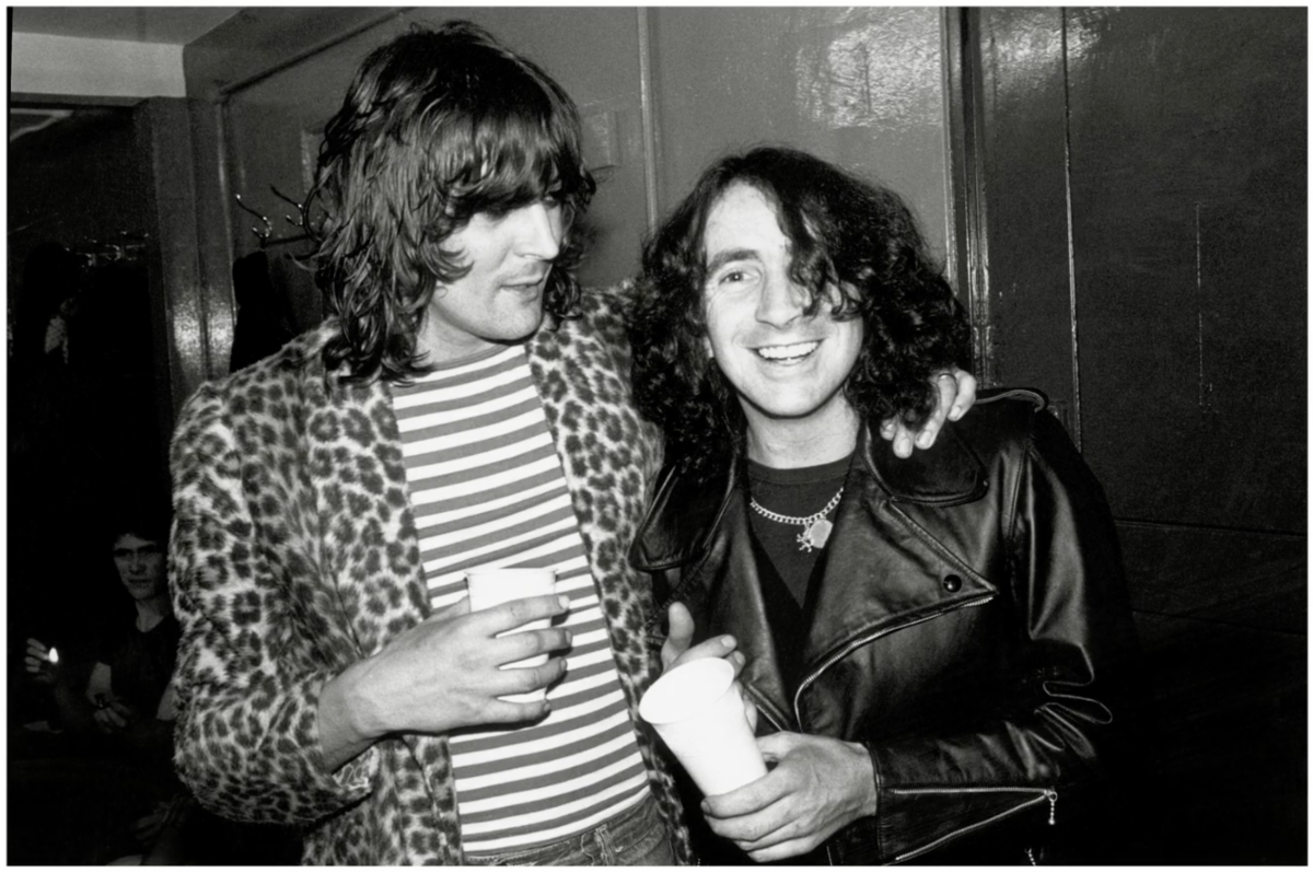 Pete Way (UFO) and Bon Scott (AC/DC). Photo credit: Ross Halfin.