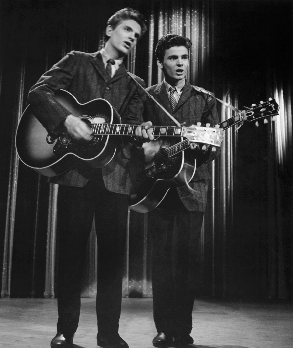 The Everly Brothers, Phil and Don, perform as guests on The Ed Sullivan Show, 1958. Photo by George Rinhart/Corbis via Getty Images.