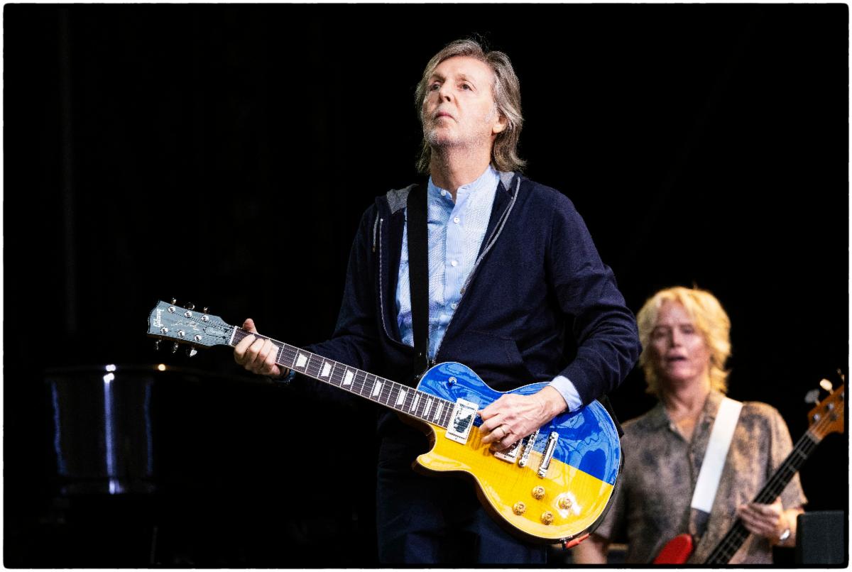 Paul McCartney performs with a custom Gibson Guitars For Peace Les Paul Standard guitar in Syracuse, NY. Photo credit: MJ Kim.