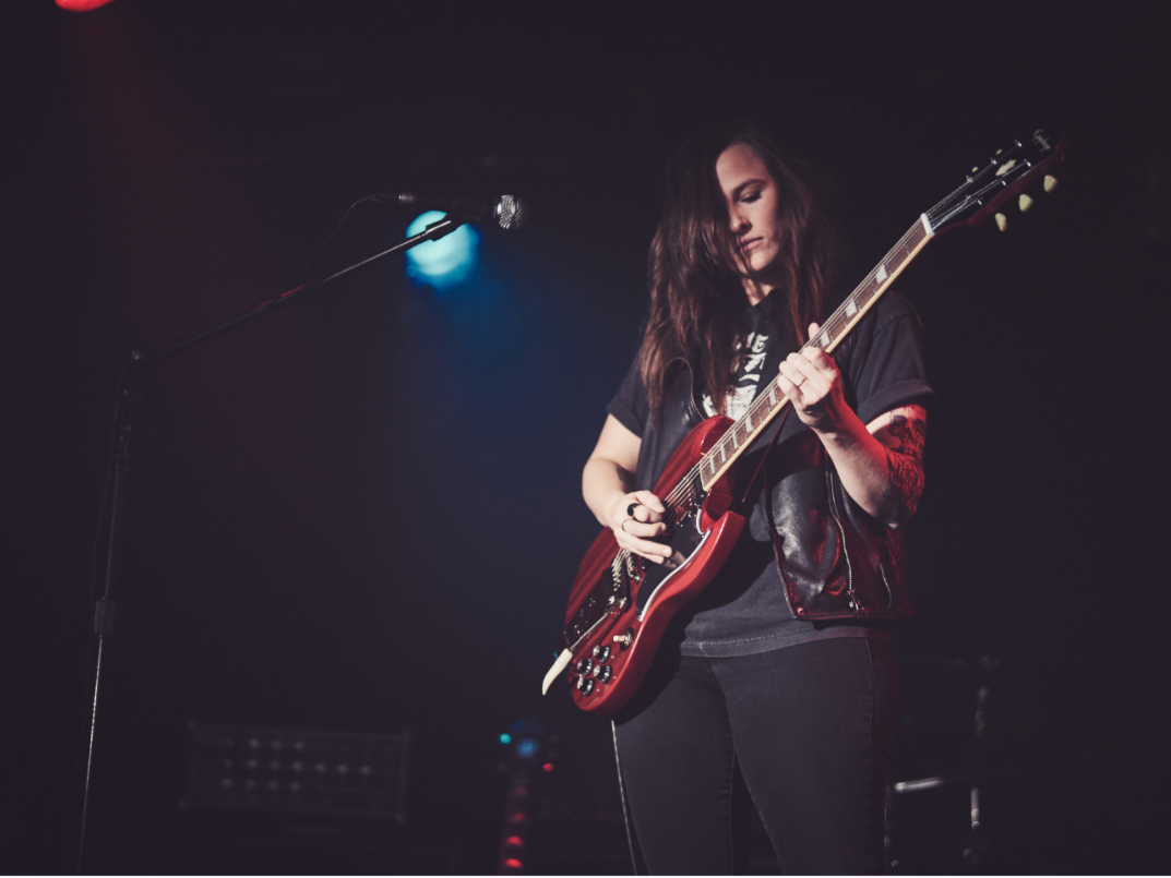 Emily Wolfe and her Epiphone SG Standard '61 Maestro Vibrola.
