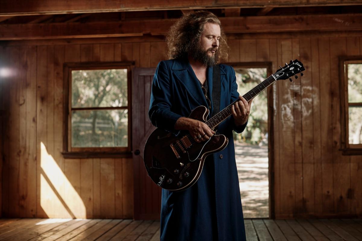 Jim James with his new Gibson ES-335 guitar.