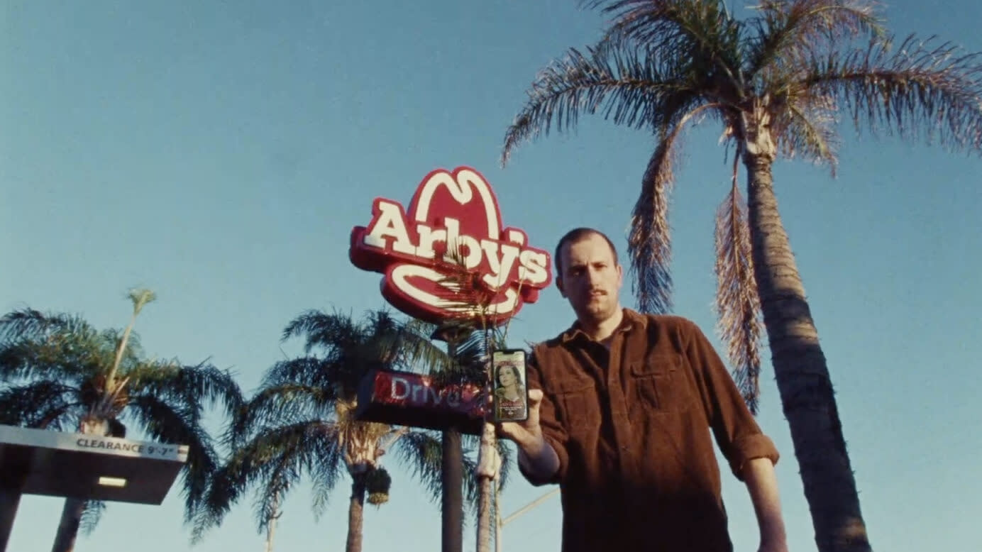 A man named Steve who got catfished looking for a hot Italian holding an Arby's Hot Italian 