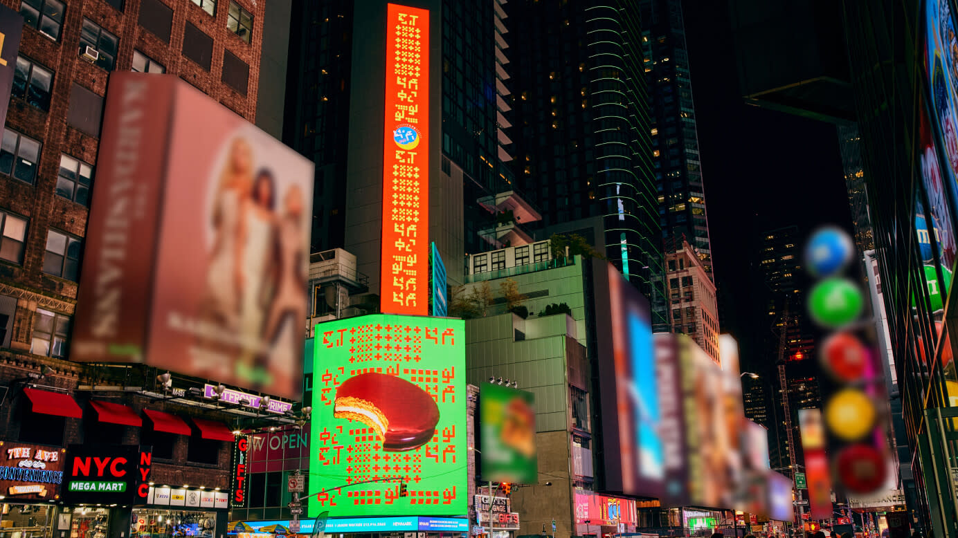 MoonPie speaking direct to alien consumers in Times Square with colorful red and green billboards