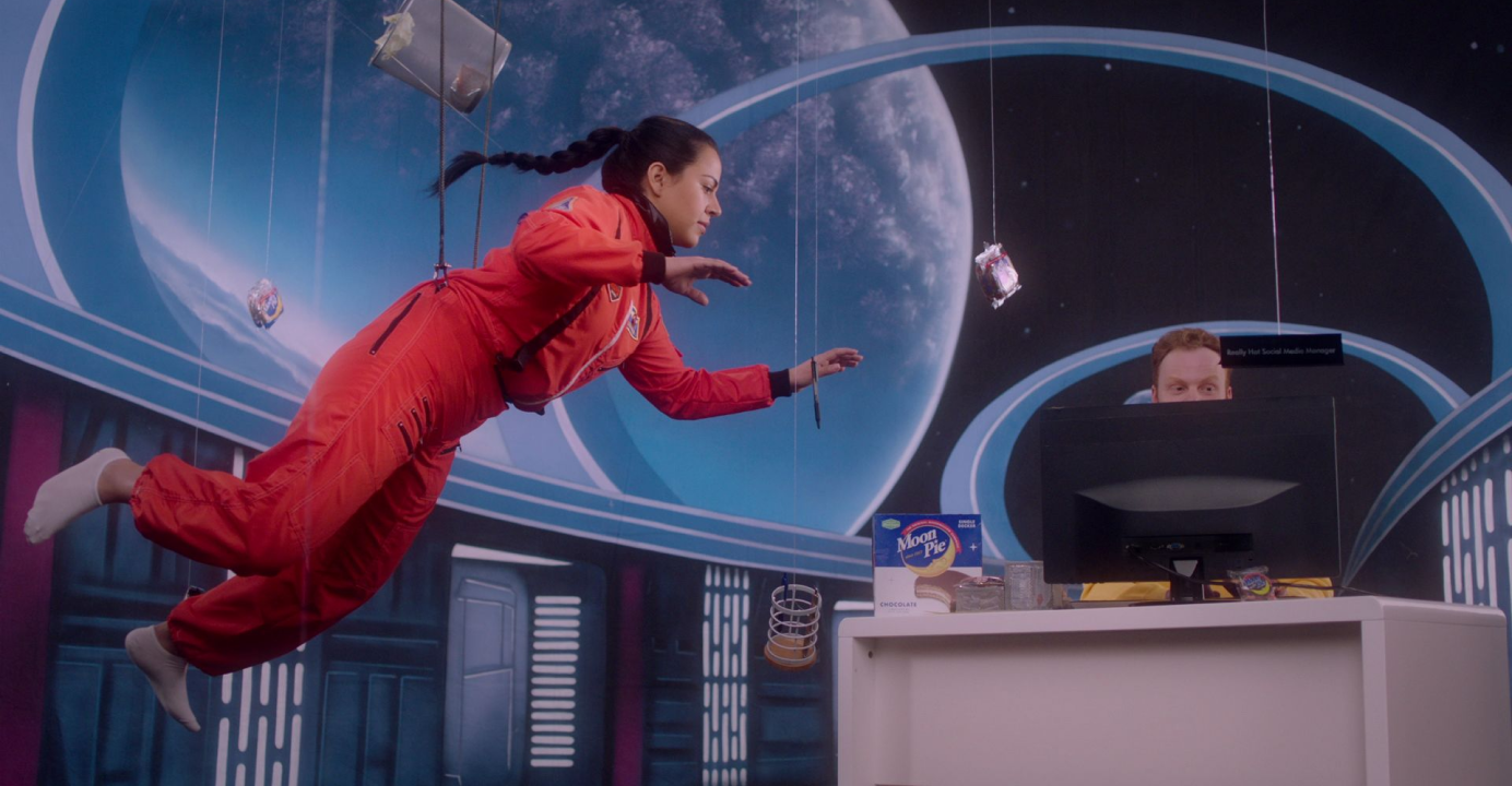 MoonPie | Outta This World campaign still, woman flying on a harness