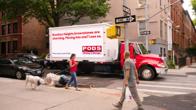 A Pods container in Brooklyn Heights with an AI generated line about brownstones