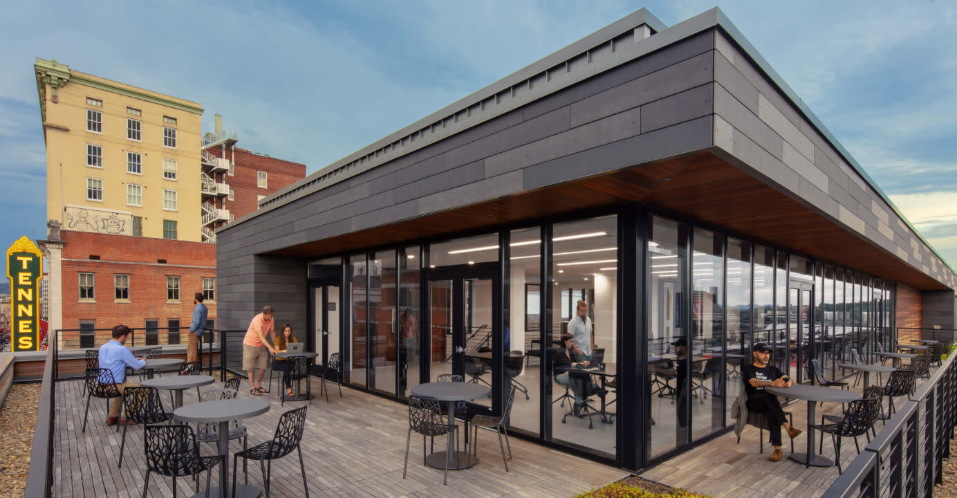 Tombras employees working on the rooftop deck at the Knoxville headquarters