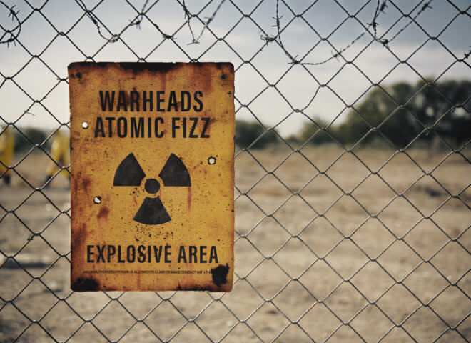 A caution sign warning nearby viewers of the explosive area