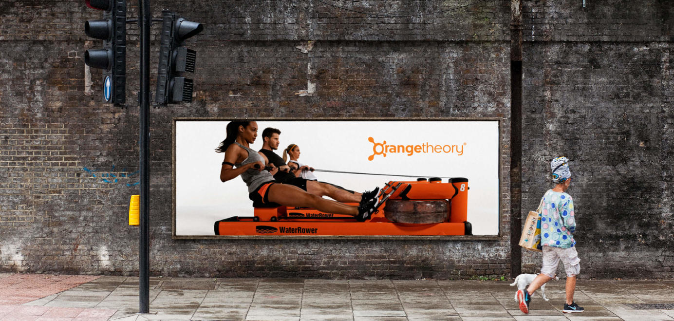 Image of an Orangetheory billboard on the streets