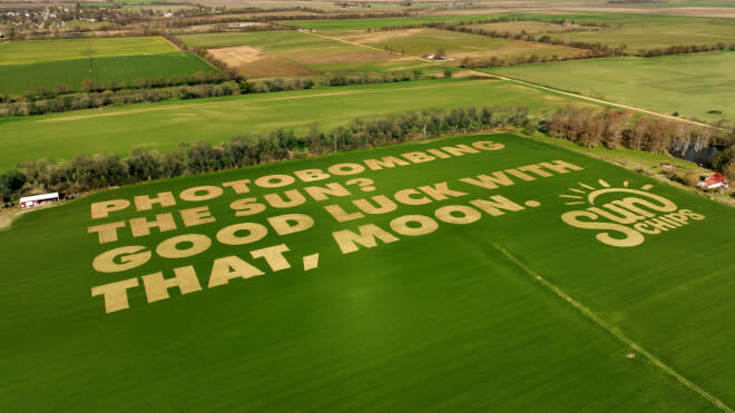 A field with the words 'photobombing the sun? good luck with that, moon' written in it