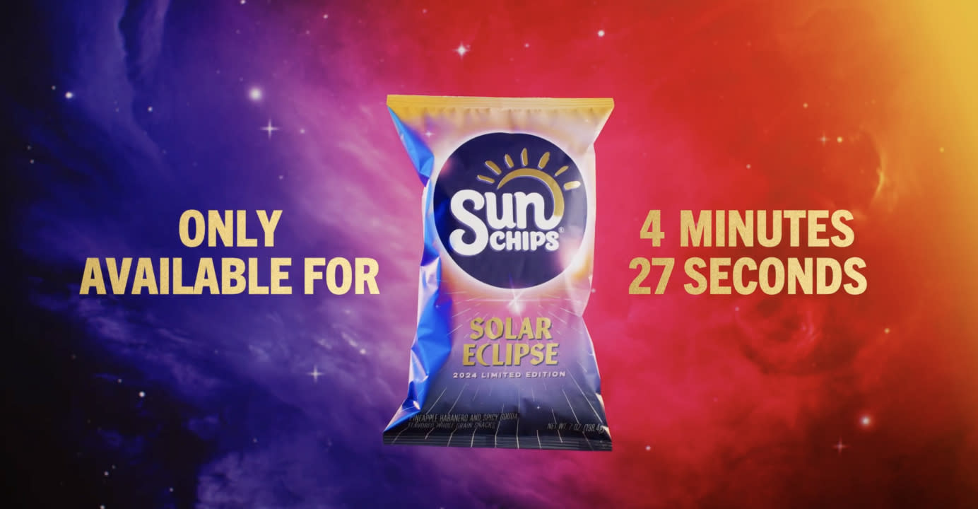 A bag of Solar Eclipse chips from SunChips on a galaxy background