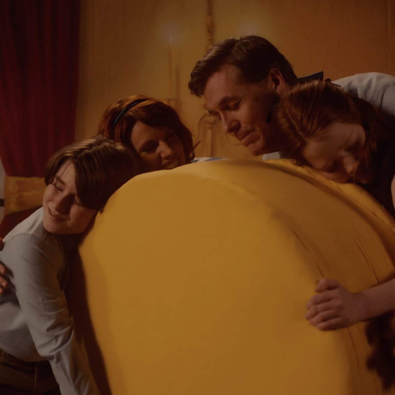 MoonPie Outta This World promo of a family hugging a giant MoonPie