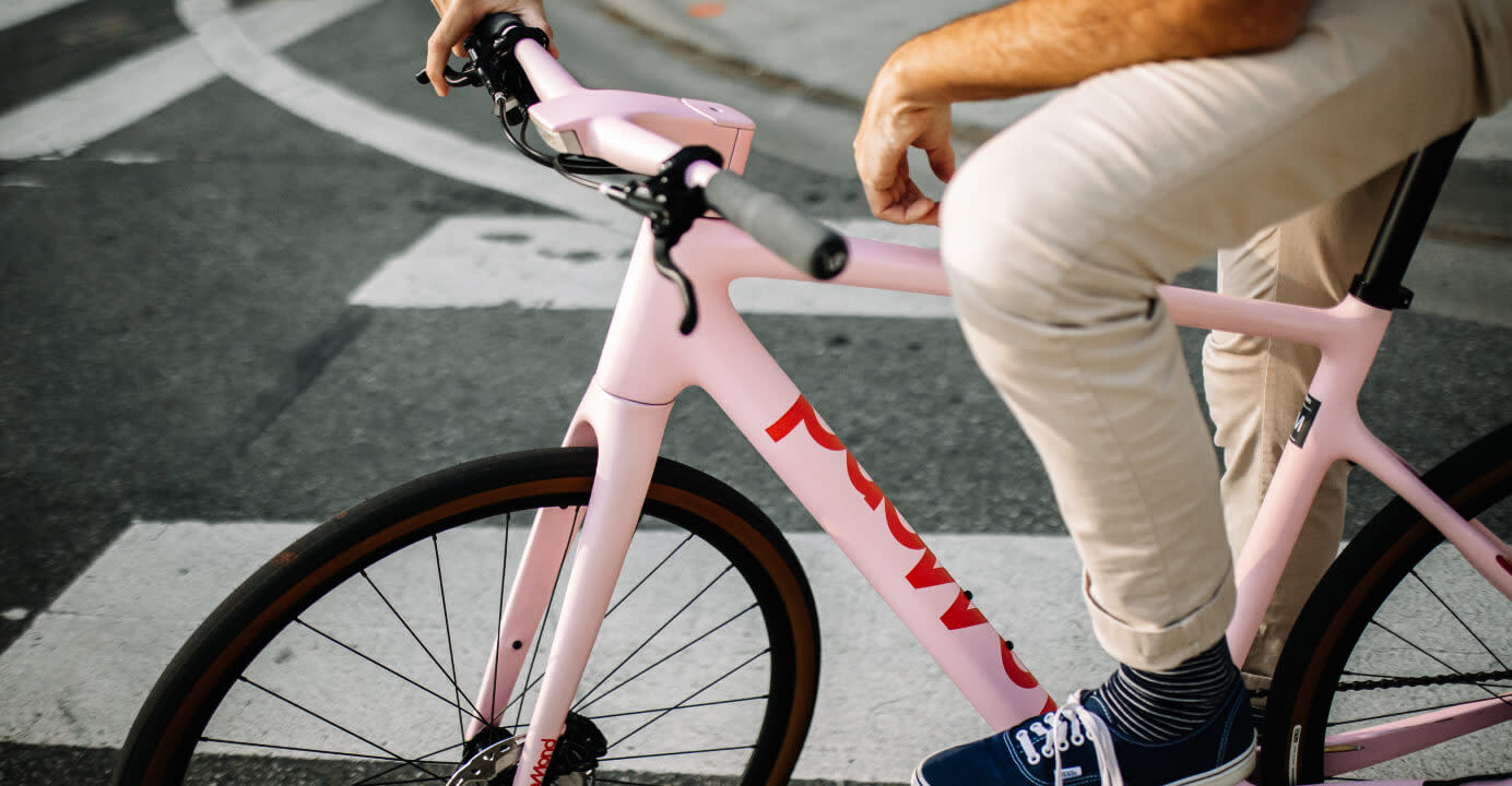 Man on pink LeMond bicycle