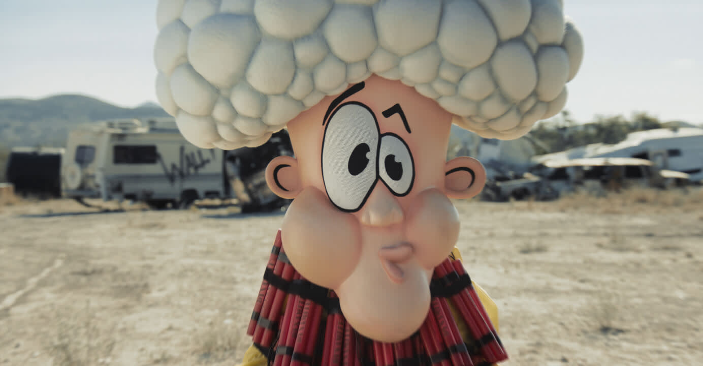 Warheads mascot standing in front of blown up RVs