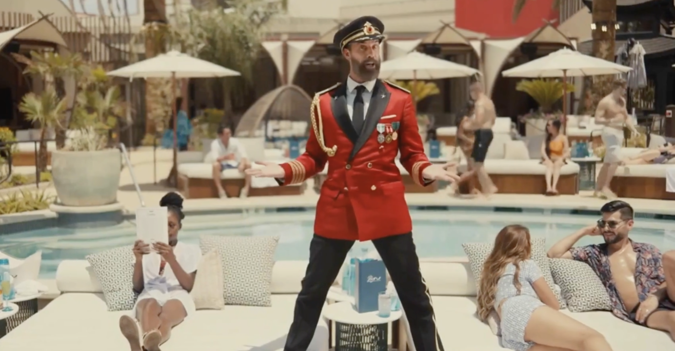 Still from the hotels.com 'Captain Obvious' video campaign | Captain Obvious at a pool in Vegas
