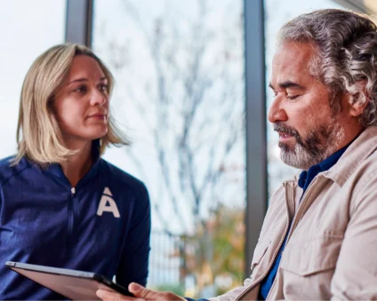 An Aspen Dental patient examines financing options.