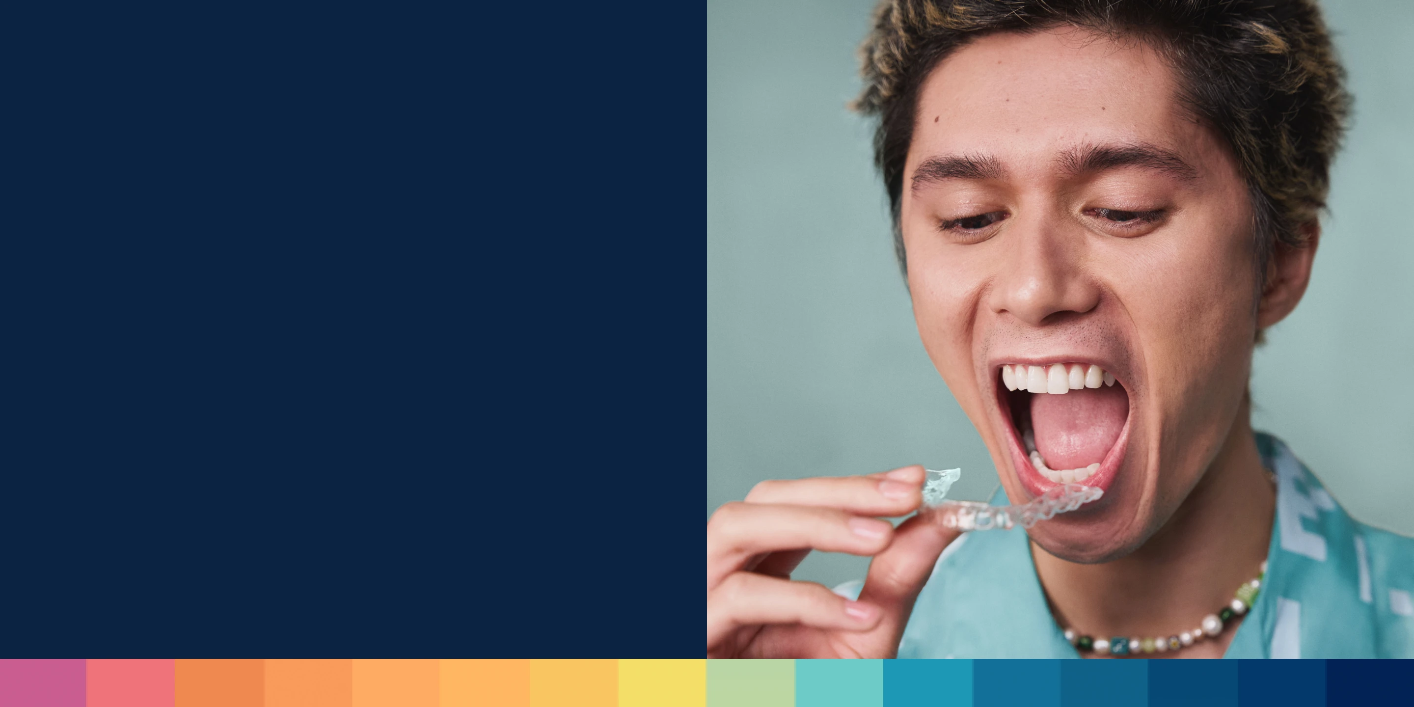 A young adult puts Motto clear aligners into their mouth. 